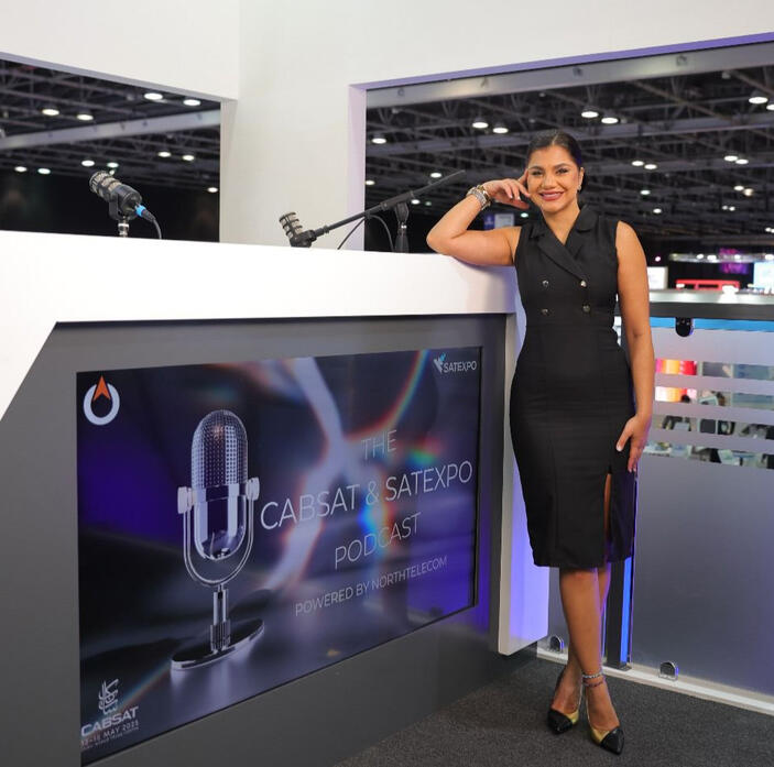 MC dija hosting the SAT Expo Podcast alt="MC Dija hosting Cabsat SatExpo podcast in Dubai"